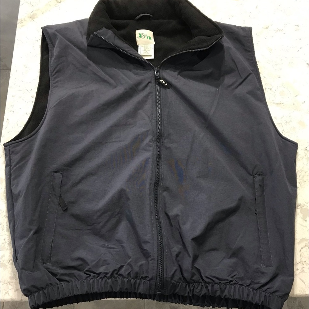 Vinta Key fleece vest zipper front,  elastic in waist, hood